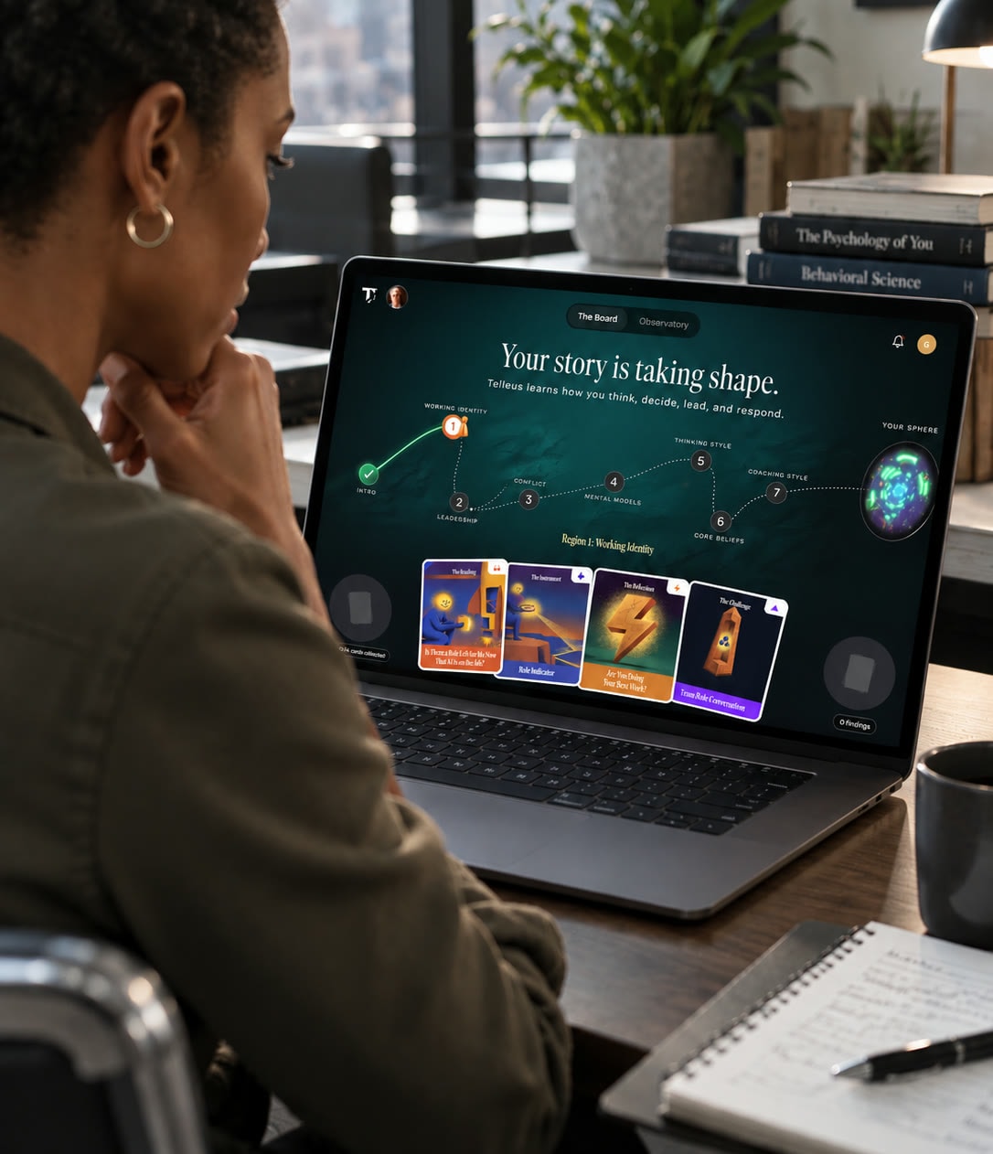 A woman studying her Telleus story on a laptop